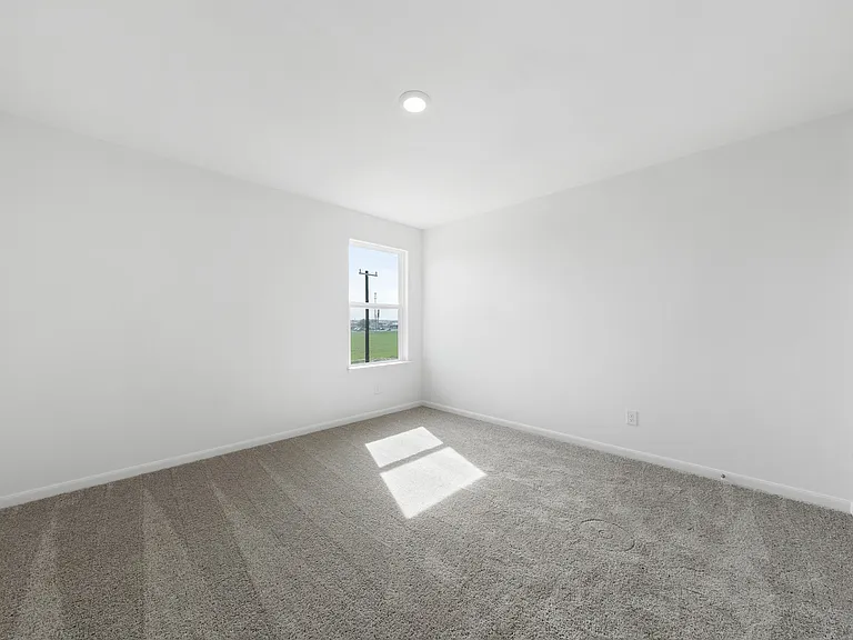 Four bedrooms are located upstairs.