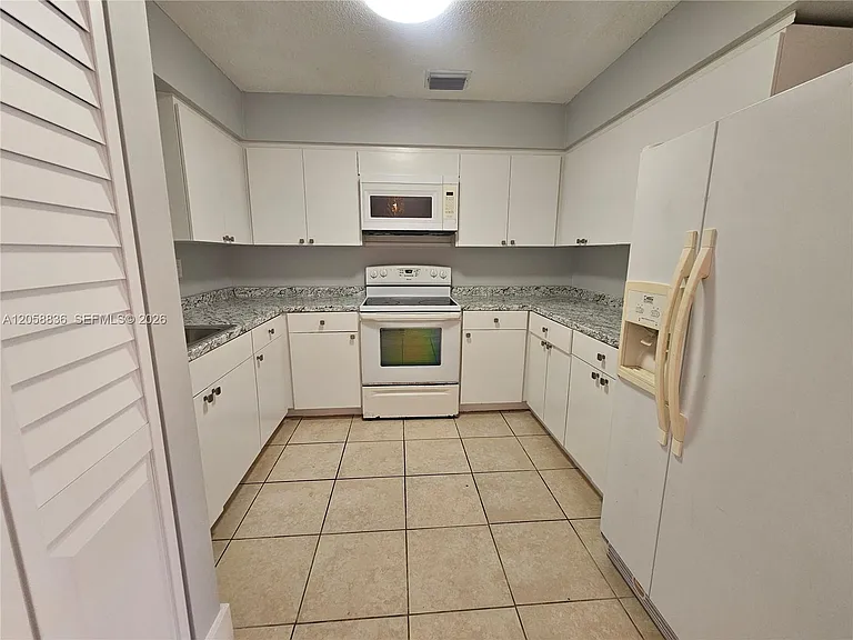 1373 NE 144th St #- — Photo 4