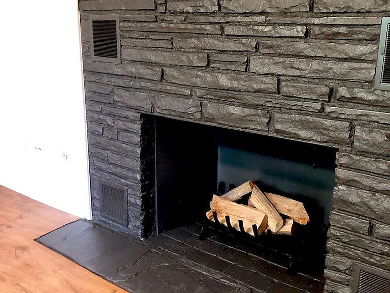 Modern fireplace in the Master Bedroom with beam mantel. (Just for a romantic mood, sorry no fires!)