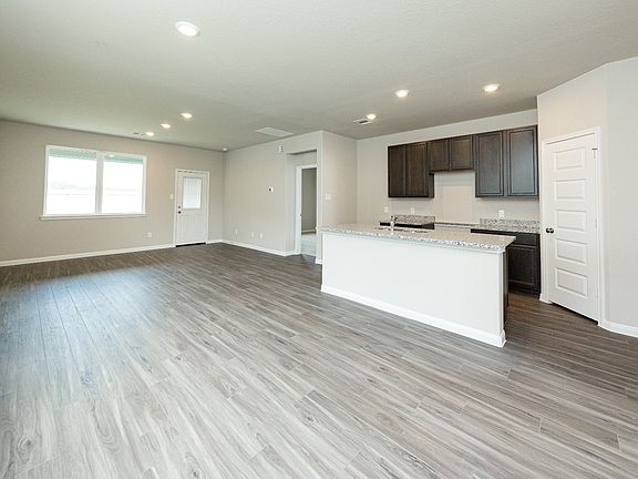 Kitchen, Dining Area, and Family Room
