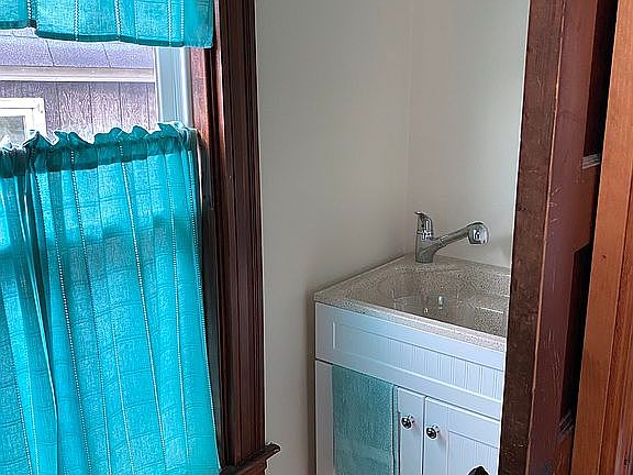 Half bath off entry way 