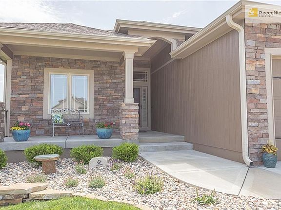 Gorgeous landscaping upgrades - zero maintenance rocks throughout!