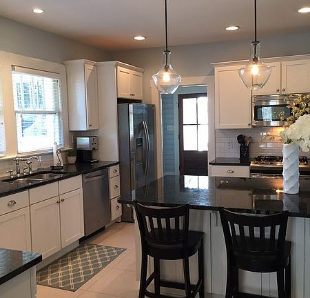 Kitchen
						:
						Granite countertops, stainless steel appliances, ample counter space