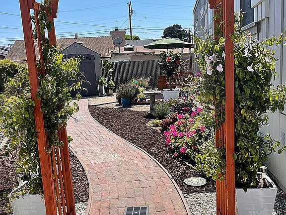 Landscaped yard, path, patio