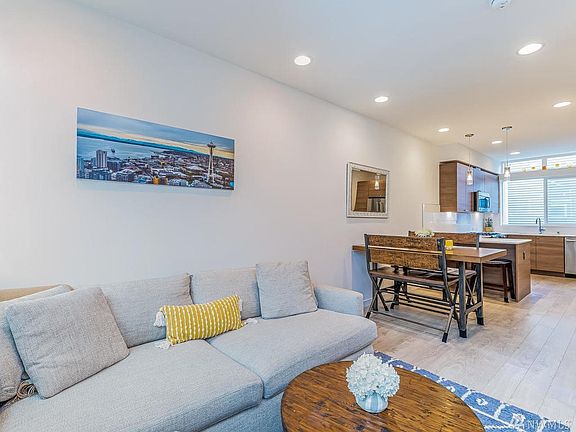 The open living room, dining room, and kitchen make for easy cooking, dining, and entertaining. 