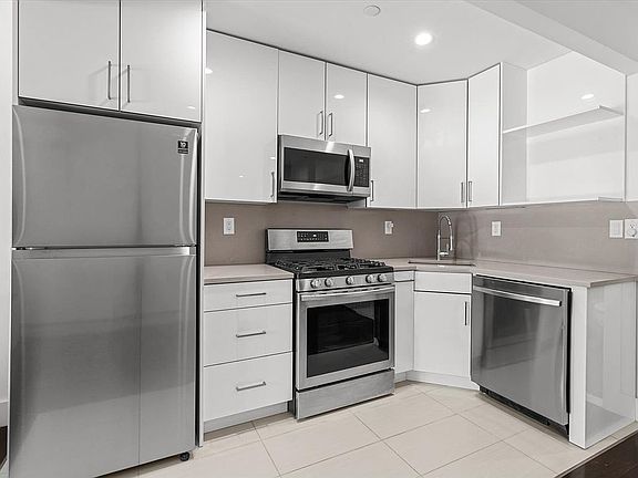 5th image of 14-40 31st Ave #2F