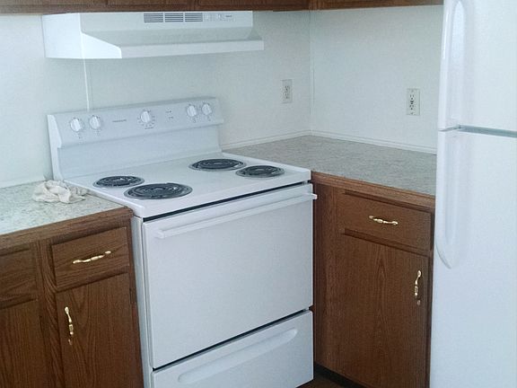 Kitchen includes Oven and Refrigerator
