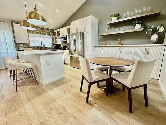 Kitchen and dining. Vaulted ceilings