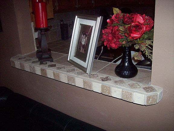 breakfast bar between kitchen and living room (new tile)