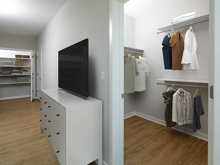 Signature Collection Bedroom with hard-surface vinyl plank flooring