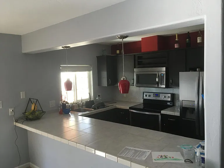Tile counters, deluxe upgraded appliances.