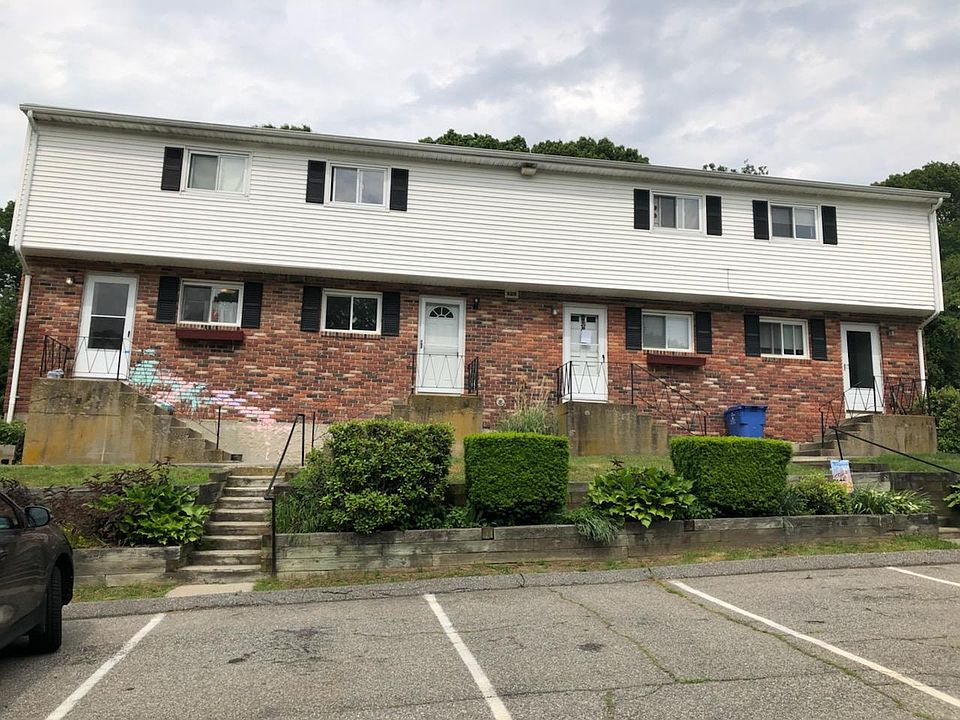 Front of townhouse with 2 assigned parking space