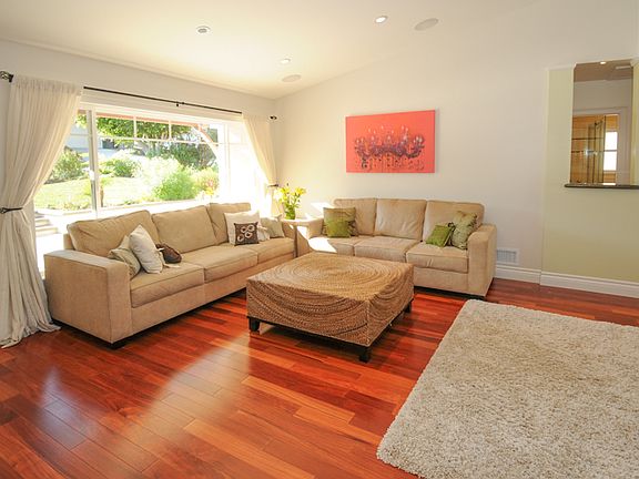 Mahogany Floors & Recessed Lights Throughout