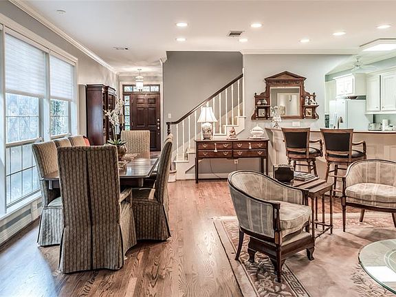 The dining area has a lot of natural light and over looks the landscaped side yard. The hardwood floors continue in all of the living space which allows and easy transition in this open room.