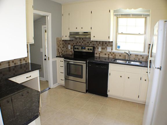 Kitchen with granite, back-splash, new sink