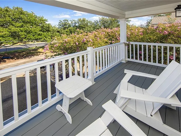 Private east-facing master patio. Perfect for a glass of wine or beer to wind down and enjoy the sound of the ocean and sunset.