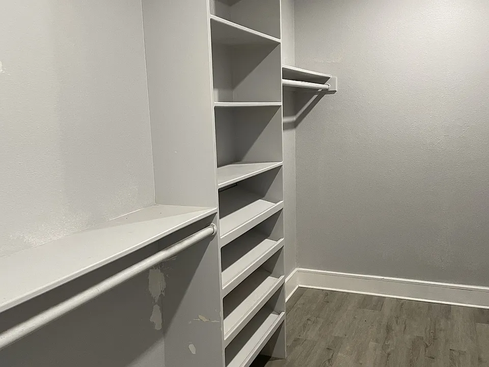 Walk-in clothes closet.