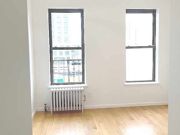 5th image of 208 E 124th St APT 15