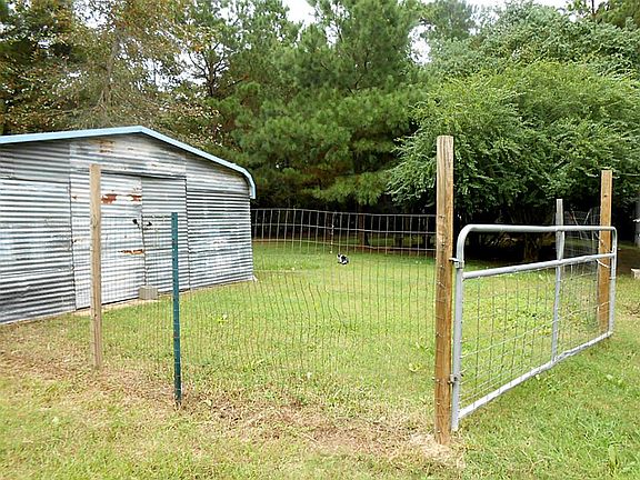 Partial fencing around backyard.