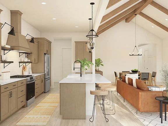 Kitchen with spacious island and pendant lighting