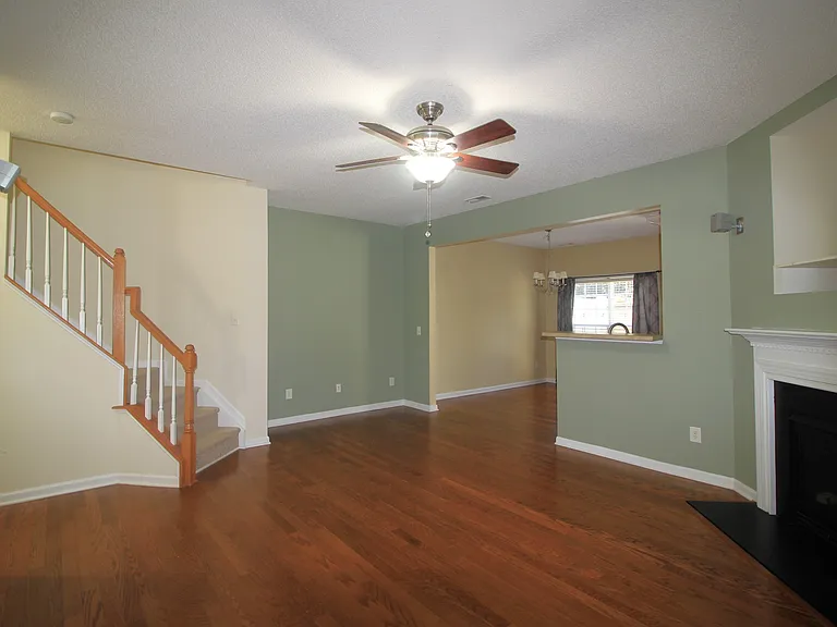 Living room facing the stairs to the second floor