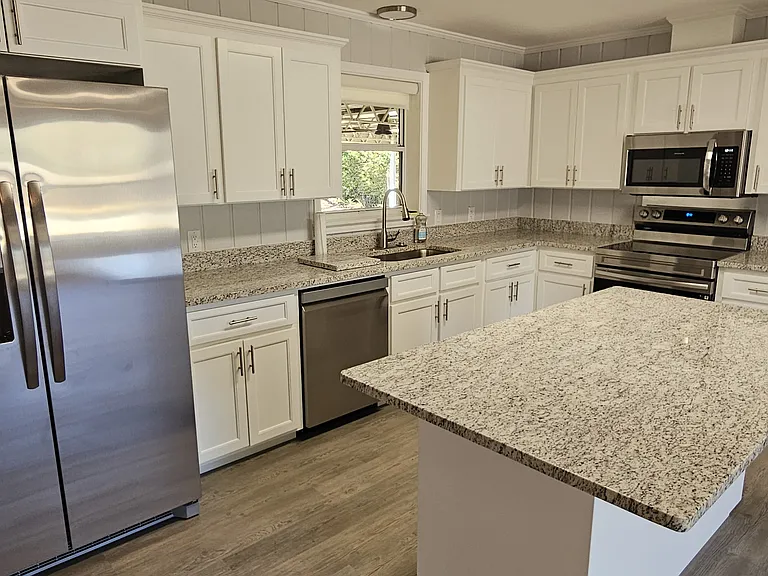 Kitchen - new stainless steel appliances, granite countertops, shaker style cabinets