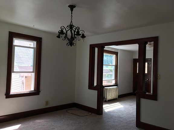 Floors are now hard wood with large area rugs to be delivered soon. Photos will be updated.