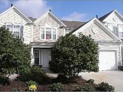 Front of home with 2-car gar