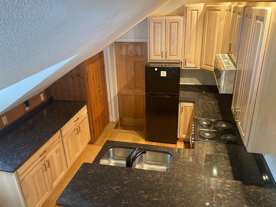 Brand new granite kitchen with new stove, microwave fridge and washer dryer