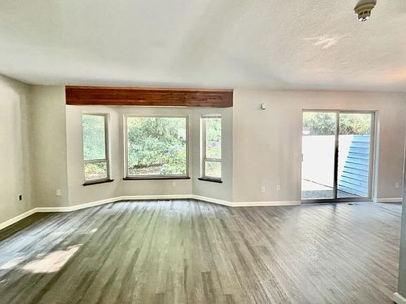 Living Area looking into the backyard and greenbelt