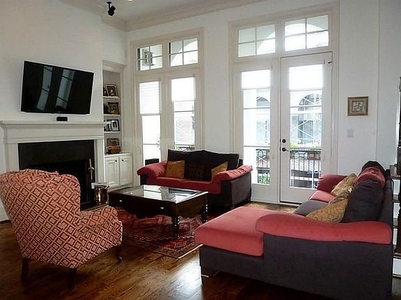 The second floor living area is full of with natural light.