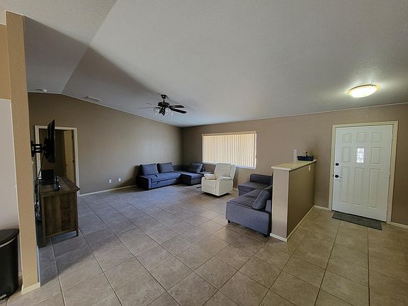 Spacious living room with sofas that can easily convert to sofa beds.