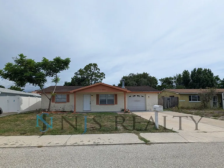 7024 Rockwood Dr — Photo 2