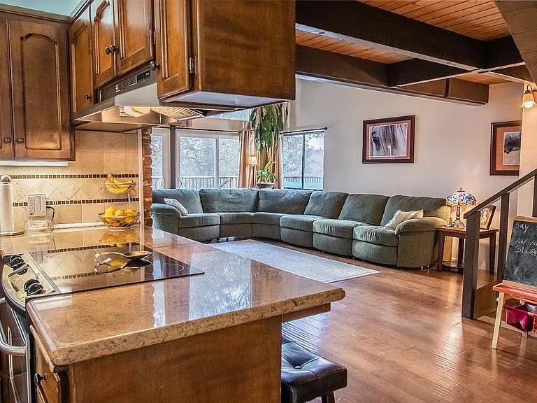 Kitchen opens to living area