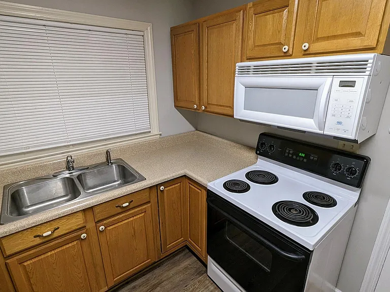 KITCHEN INCLUDES, (Refrigerator, Range, Microwave, Dishwasher, Washer and Dryer)