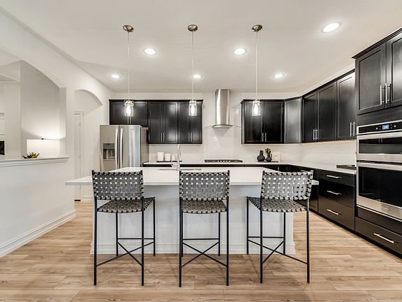 Spacious kitchen with eat-in bartop