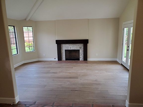 Living room with European Oak floor and french door.