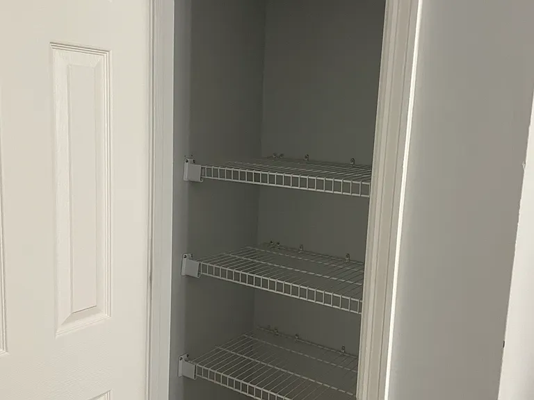 The handy linen closet is located in the hall at the top of the stairs.