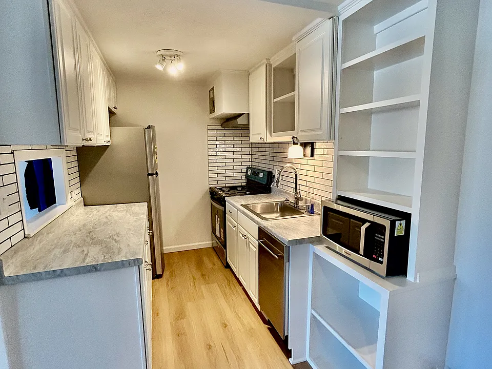 All new appliances in the kitchen-refrigerator, gas range, dishwasher, and microwave.