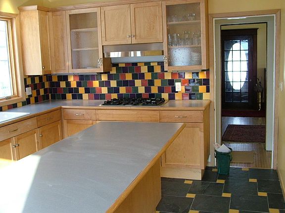 Kitchen, center island, heated floor, front door