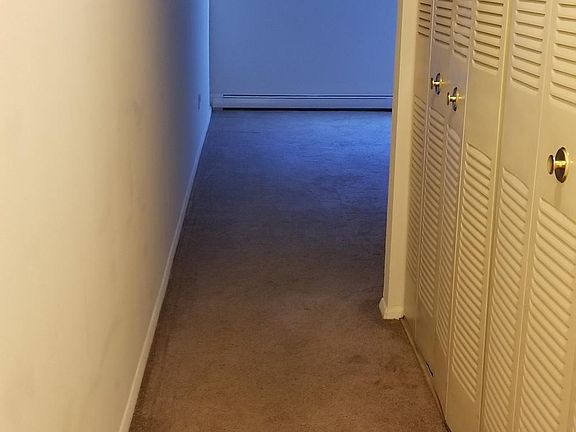 Hallway with lots of closet space