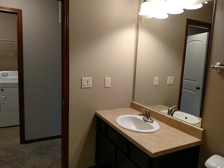 Second floor, full bathroom with tub-shower.