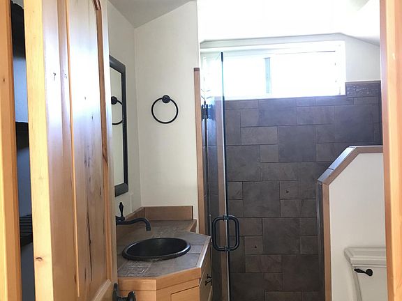 Stone shower with bench