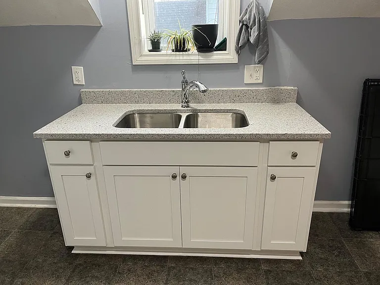 New Kitchen Sink, Cabinets and Quartz Countertop just replaced.
