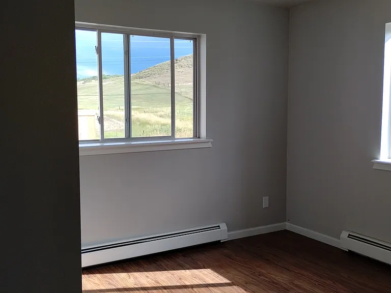 3rd bedroom - view of ranch behind property