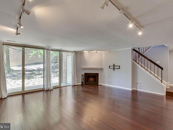 Wide OPEN living room area w/ fireplace