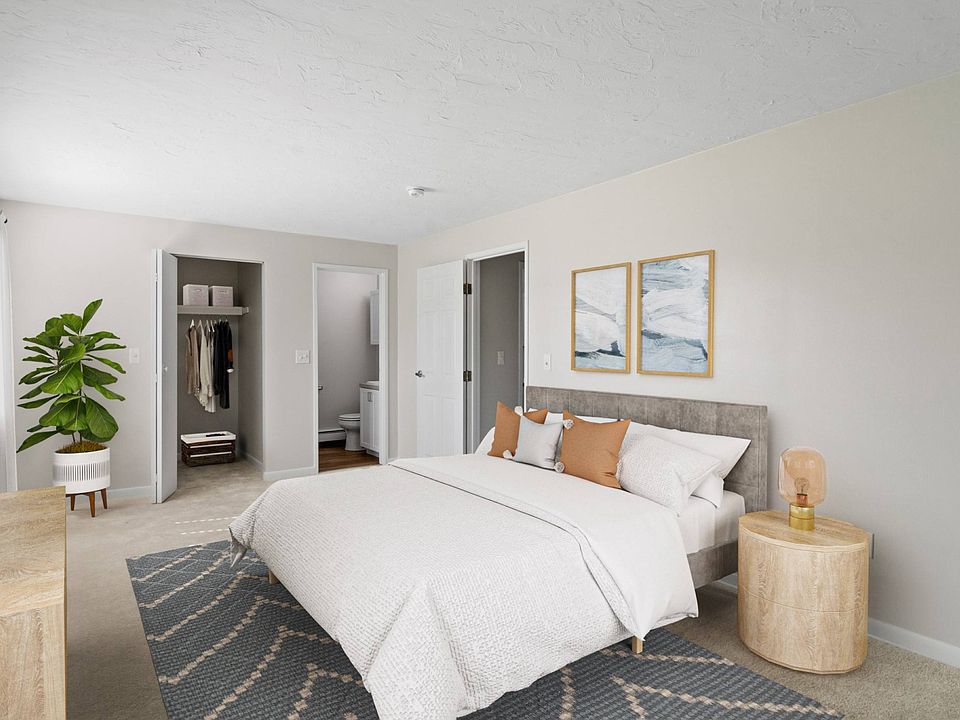 Bedroom flooded with natural light at Rosemont Square in Randolph, MA 02368