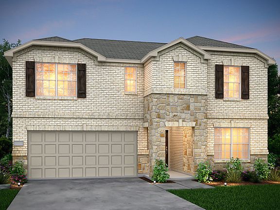 The Thomaston, with 2-car garage and stone accents shown as Exterior F