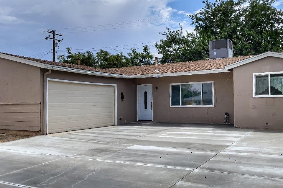Front of the Home with parking for up to 6 cars/ or RV Parking.
