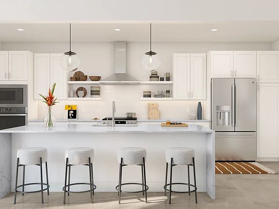 Kitchen with pendant lighting and floating shelves